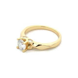 Round solitaire on faceted band moissanite ring in yellow gold vermeil over sterling silver