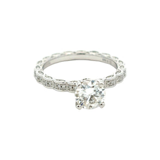 Round solitaire on scalloped pavé band moissanite ring in sterling silver