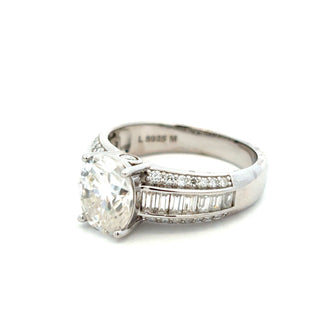 Round solitaire with channel baguette shoulders moissanite ring in sterling silver