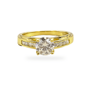 Round solitaire with channel-set square shoulders moissanite ring in yellow gold vermeil over sterling silver
