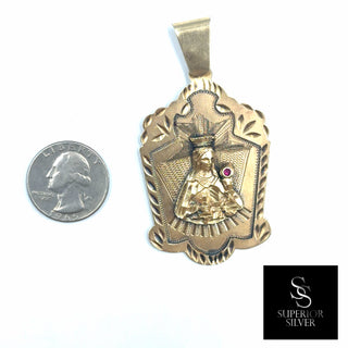 Saint Lazarus 10K Yellow Gold Pendant with Ruby quarter size comparison