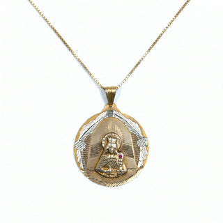 Superior Silver pre-owned Santa Barbara medallion pendant in 10K yellow gold with a ruby and diamond-cut detailing.