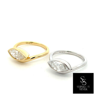 Sideways marquise bezel polished band moissanite ring in sterling silver and yellow gold vermeil, side by side