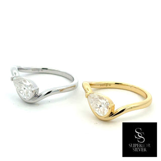 Sideways pear wave band moissanite ring in sterling silver and yellow gold vermeil, side by side