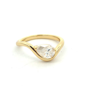 Sideways pear wave band moissanite ring in yellow gold vermeil over sterling silver