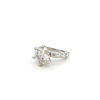 Six-Prong round with large stone-set band moissanite ring in sterling silver