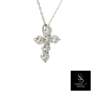 Six-stone prong cross moissanite necklace in sterling silver