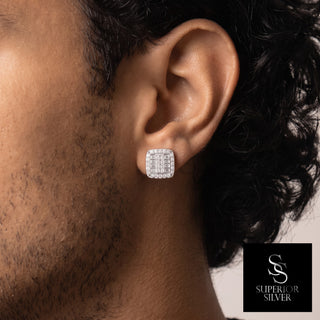 Square Baguette Center Pavé Halo Moissanite Stud Earrings in sterling silver, worn on model