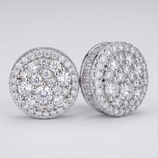 Close-up of the sterling silver round cluster showing the channel-set baguette side wall