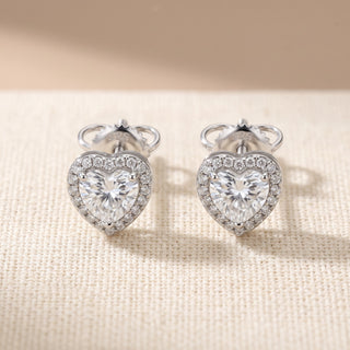 Sterling silver heart shaped halo moissanite stud earrings, macro detail