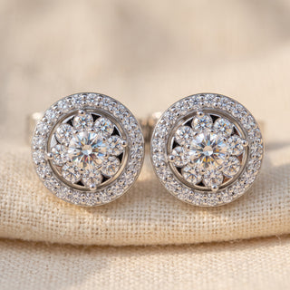 Close-up of the sterling silver double halo stud showing the flower cluster centre and pave outer halo