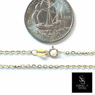Superior Silver 10K yellow gold diamond-cut link chain with lobster clasp shown next to a US quarter for scale.