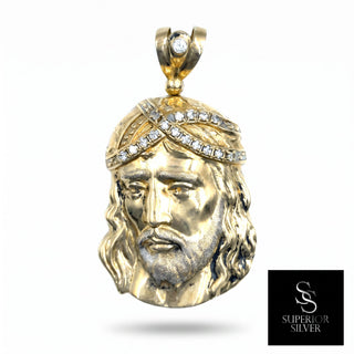Superior Silver 10K yellow gold Jesus pendant featuring a crown of thorns accented with sparkling CZ stones.