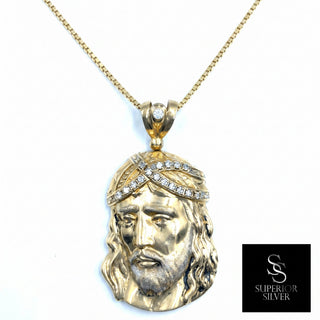 Superior Silver 10K yellow gold Jesus pendant featuring a crown of thorns accented with sparkling CZ stones.