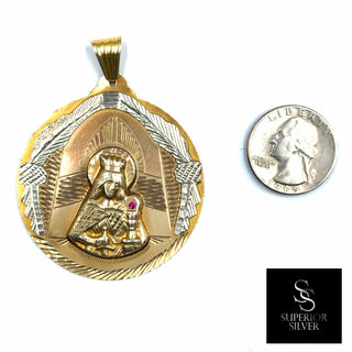 Superior Silver pre-owned 10K yellow gold Santa Barbara medallion pendant featuring a ruby and diamond-cut detailing.