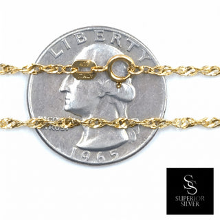 Superior Silver 10K yellow gold Singapore link chain with spring ring clasp shown against a US quarter for scale