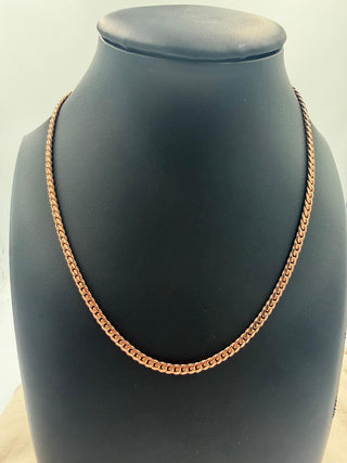 Superior Silver 16-inch Miami Cuban link chain crafted from solid 10K rose gold with a 3.9mm width on a display bust.