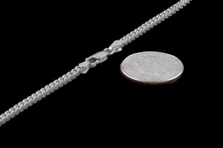Superior Silver 2.5mm Franco chain necklace in polished 925 sterling silver with a lobster clasp, shown with a coin.