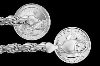 Superior Silver 8mm sterling silver rope chain with lobster clasp, shown next to US quarters for scale.