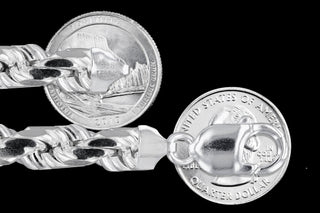 Superior Silver 9.7mm rope chain in polished 925 sterling silver with a lobster clasp, shown next to US quarters.