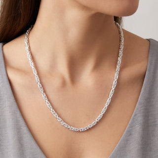 Superior Silver 20-inch Byzantine link chain crafted from polished solid 925 sterling silver worn around the neck