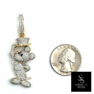 Superior Silver cartoon mouse pendant in 10K yellow gold covered in 2.88ct natural diamonds next to a US quarter.
