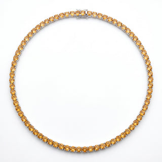Superior Silver round cut citrine tennis chain in 925 sterling silver with a continuous four-prong setting.