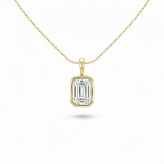Superior Silver emerald-cut VVS moissanite solitaire pendant in gold vermeil on a dainty box chain.
