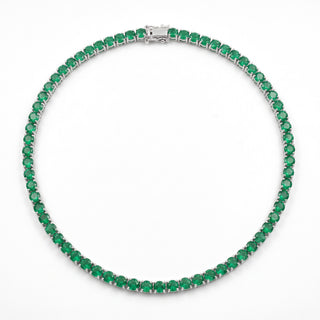 Superior Silver 18-inch tennis chain featuring round cut natural emeralds in a four-prong sterling silver setting.
