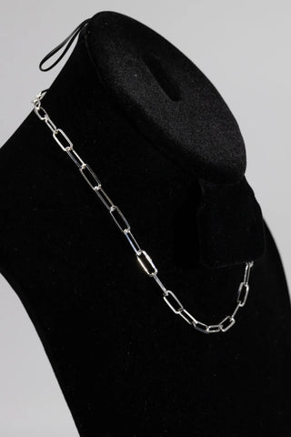Superior Silver 5.8mm flat paper clip chain necklace crafted from polished 925 sterling silver on a black display.
