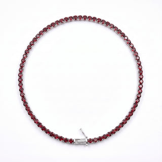 Superior Silver round cut garnet tennis chain in 925 sterling silver with a continuous line of deep red stones.