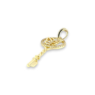 Superior Silver gold-plated sterling silver key pendant featuring a butterfly design and cubic zirconia accents.