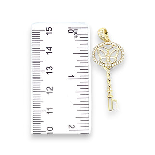 Superior Silver gold-plated sterling silver key pendant featuring a butterfly design with cubic zirconia stones.