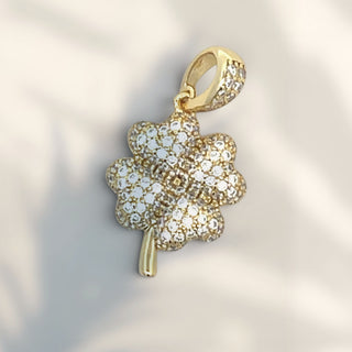 Superior Silver gold-plated sterling silver four-leaf clover pendant with sparkling cubic zirconia stones.