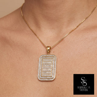 Superior Silver dog tag pendant in 10K yellow gold featuring 2 carats of baguette and round cut natural diamonds.