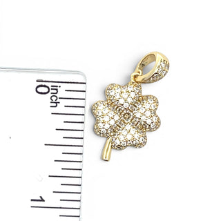 Superior Silver gold-plated sterling silver flower charm pendant with sparkling cubic zirconia stones.