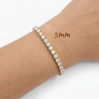 Superior Silver 3mm round brilliant moissanite tennis bracelet in gold vermeil on a wrist