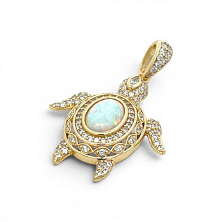 Superior Silver gold-plated sterling silver turtle pendant with an iridescent opal center and cubic zirconia accents.