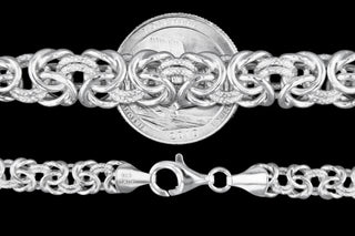 Superior Silver 10mm graduated byzantine chain in 925 sterling silver with lobster clasp, shown next to a US quarter.