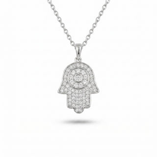 Superior Silver iced-out hamsa hand pendant in sterling silver with VVS moissanite stones and evil eye detail.