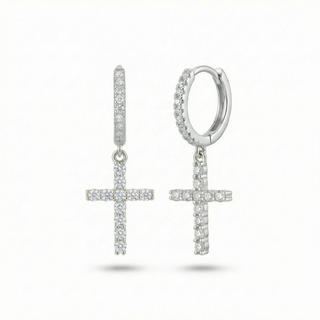 Silver cross-shaped earrings on a white background