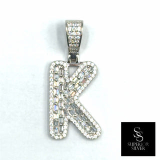 Superior Silver letter K pendant in sterling silver featuring baguette and round pave-set cubic zirconia stones.