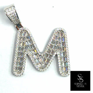 Superior Silver block letter M pendant in sterling silver with pave-set baguette and round cubic zirconia stones.