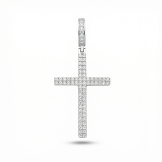 Silver cross pendant with clear stones on a white background