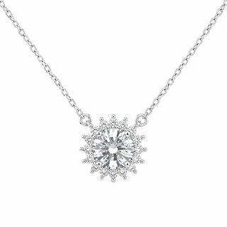 Superior Silver 1ct round cut moissanite halo pendant on a 1mm sterling silver cable chain necklace.
