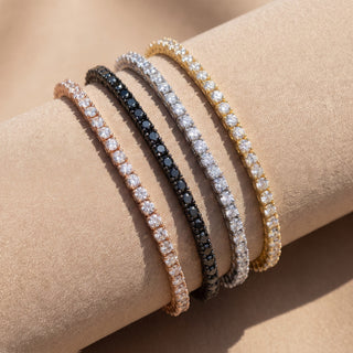 Superior Silver moissanite tennis bracelets in rose gold, black rhodium, white gold, and gold vermeil finishes.