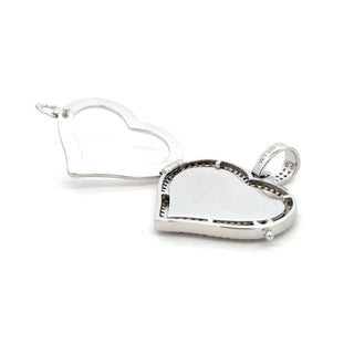 Close-up of the pavé edging on the Superior Silver open heart moissanite pendant in sterling silver.