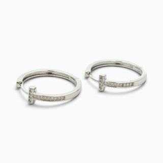 Superior Silver sterling silver huggie hoop earrings featuring a pavé moissanite T-bar design on a polished band.