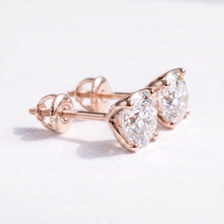 Superior Silver Portuguese cut moissanite stud earrings in rose gold vermeil with secure screw backs.