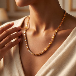 Superior Silver round cut citrine tennis chain in sterling silver worn on a model.